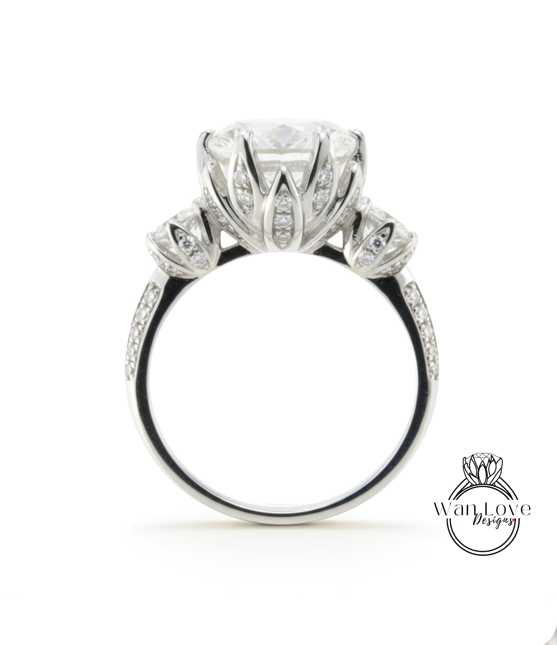 A stunning diamond engagement ring with a large central diamond surrounded by smaller diamonds on the band.