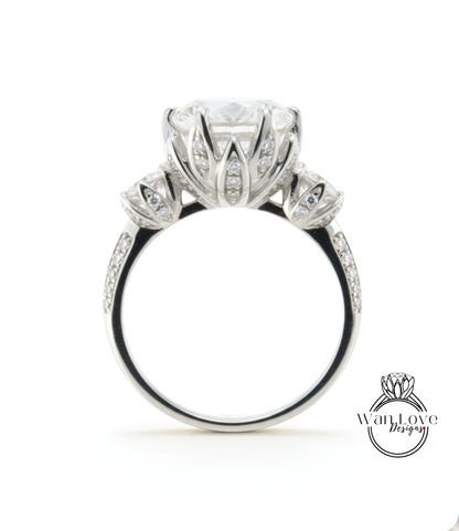 A stunning diamond engagement ring with a large central diamond surrounded by smaller diamonds on the band.