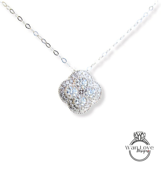 A necklace with a large, sparkling diamond pendant.