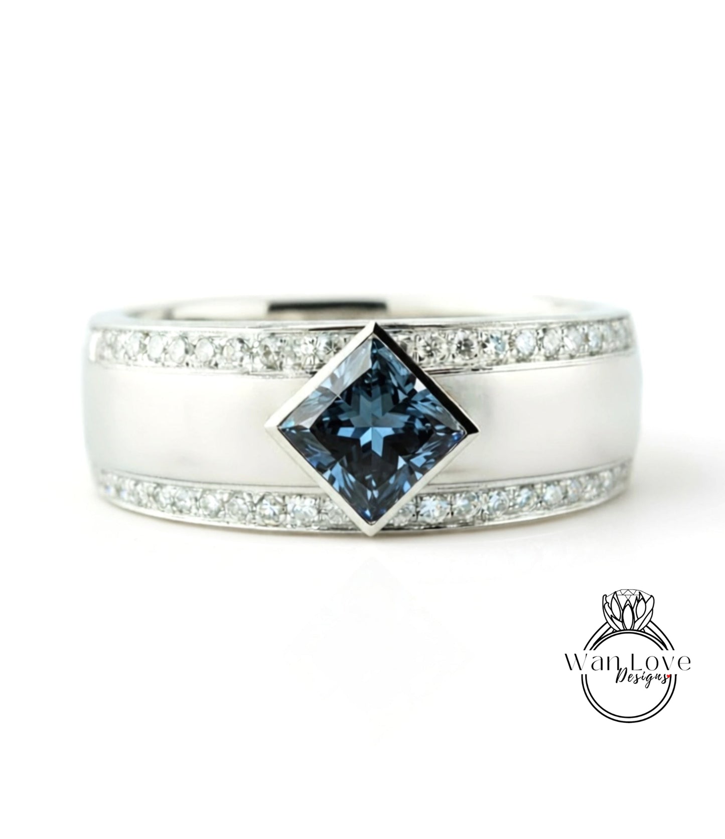 A silver ring with a large blue gemstone in the center, surrounded by smaller diamonds.