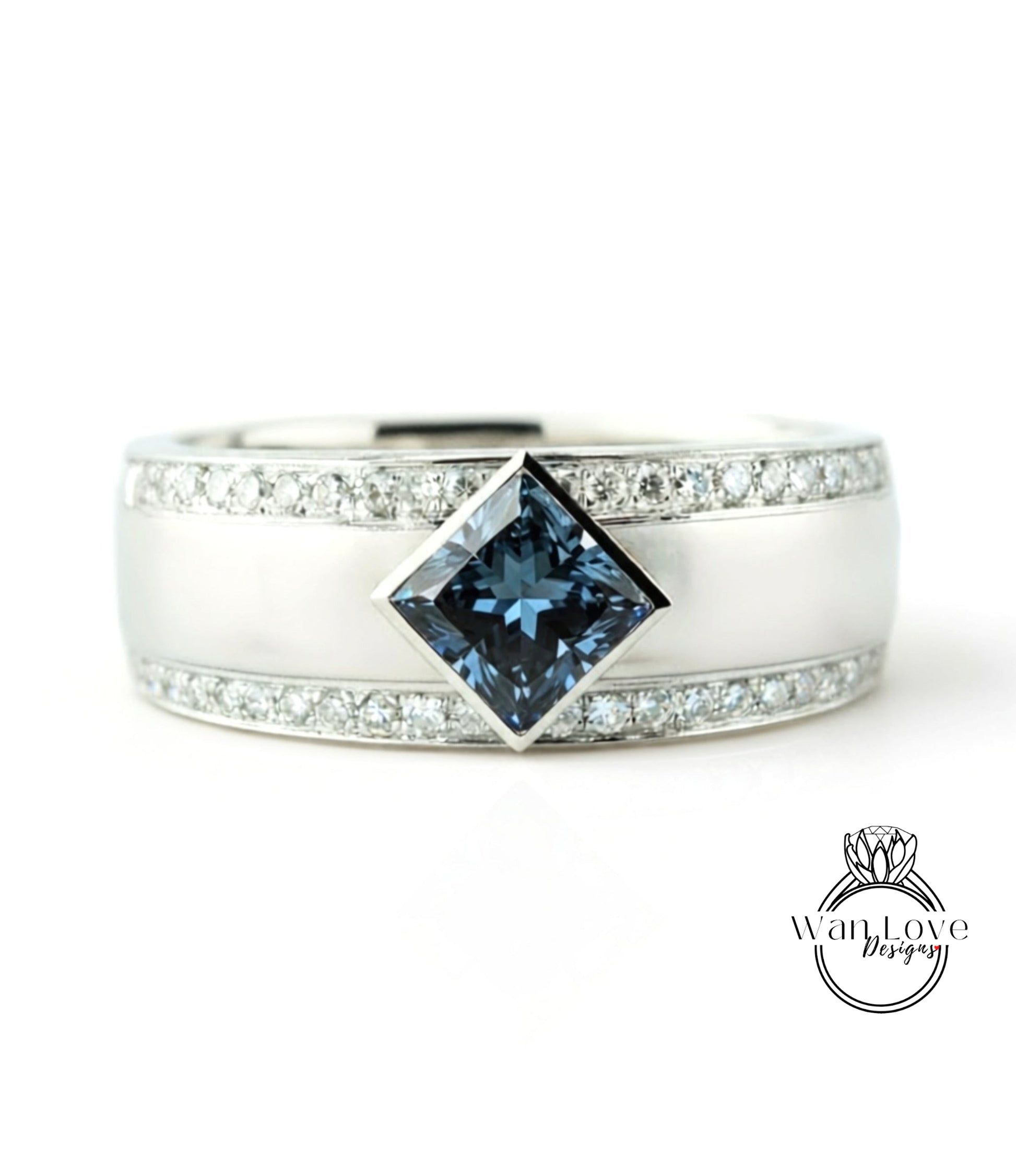 A silver ring with a large blue gemstone in the center, surrounded by smaller diamonds.