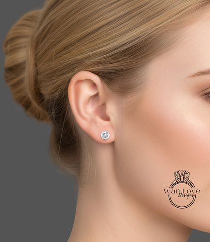 A close-up of a woman's face, focusing on her ear with a diamond earring.