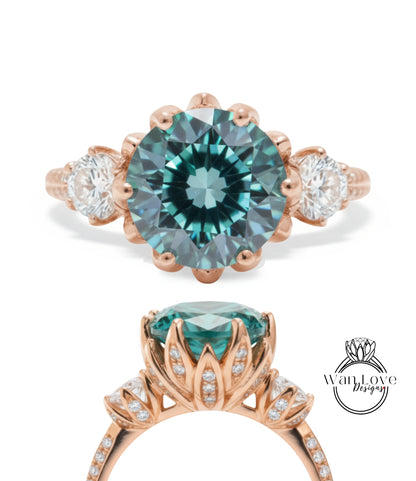 a beautiful engagement ring with a large blue gemstone set in a rose gold band. The ring is adorned with smaller diamonds and has a delicate floral design around the gemstone.