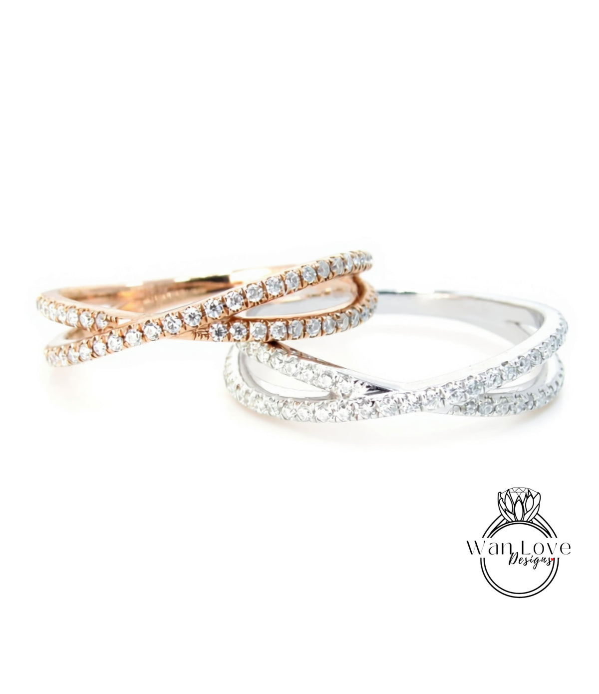 two rings with a combination of silver and gold designs, featuring a large number of small diamonds.