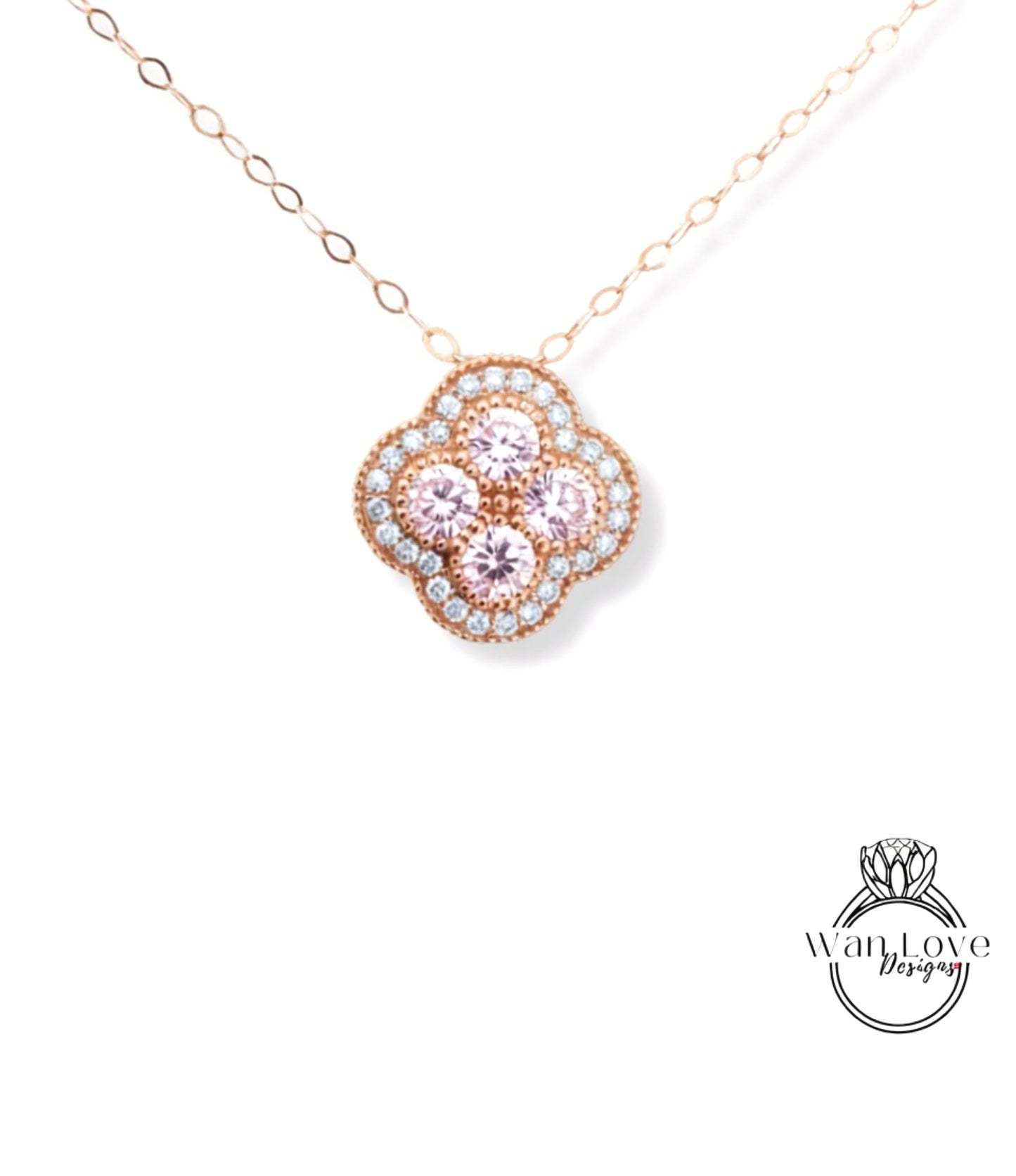 A delicate necklace with a pendant featuring a floral design and small diamonds.