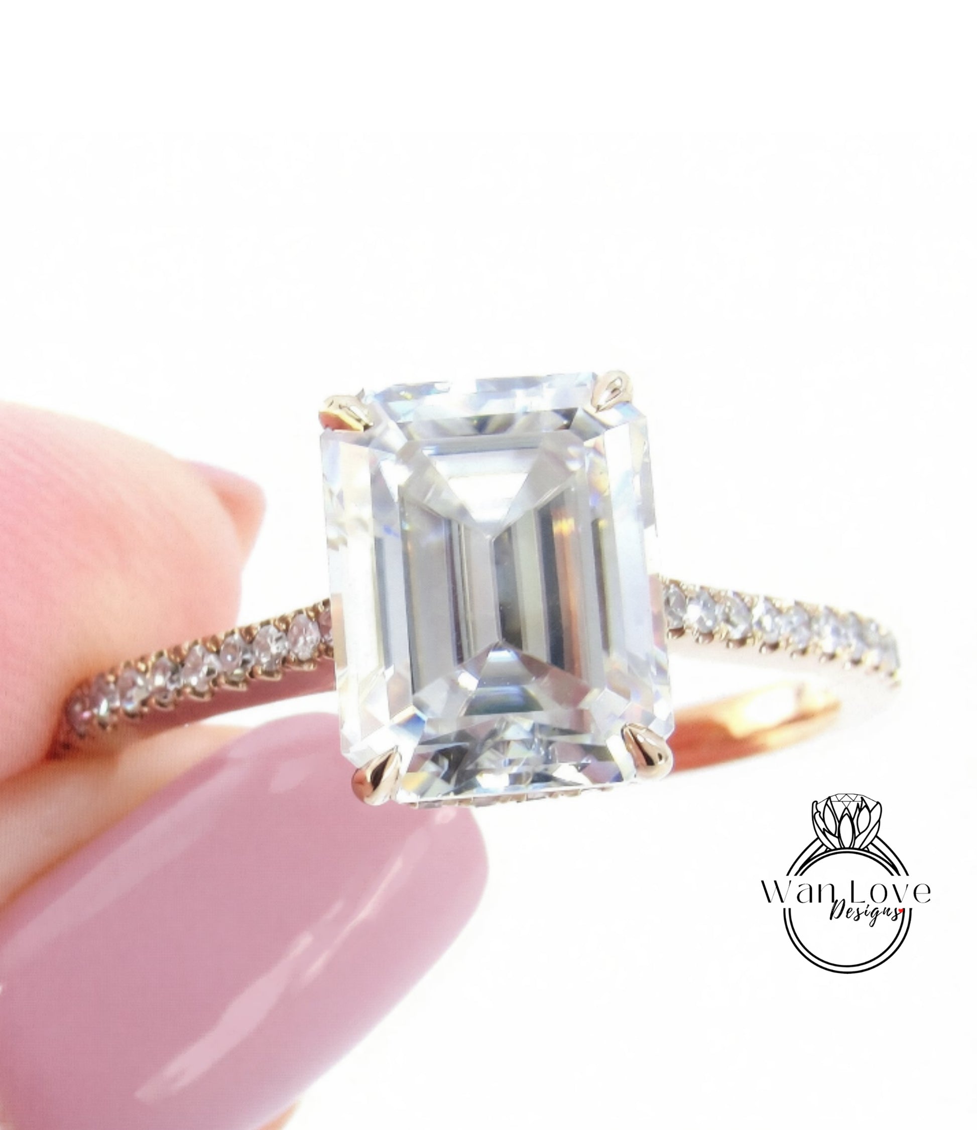 A close-up of a diamond engagement ring being held by a person's hand, with a large, clear gemstone set in a gold band.