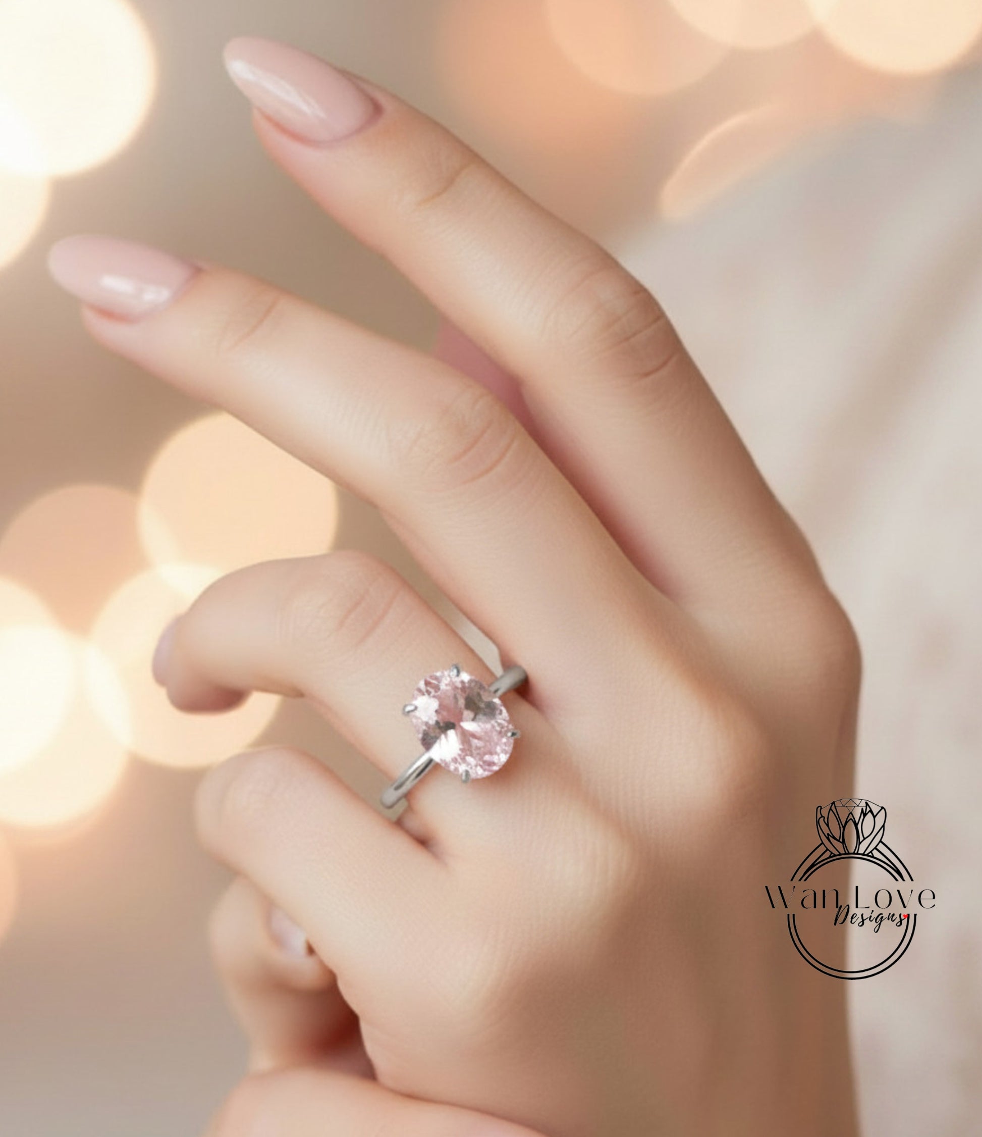 A close-up of a hand wearing a ring with a large oval-shaped gemstone.
