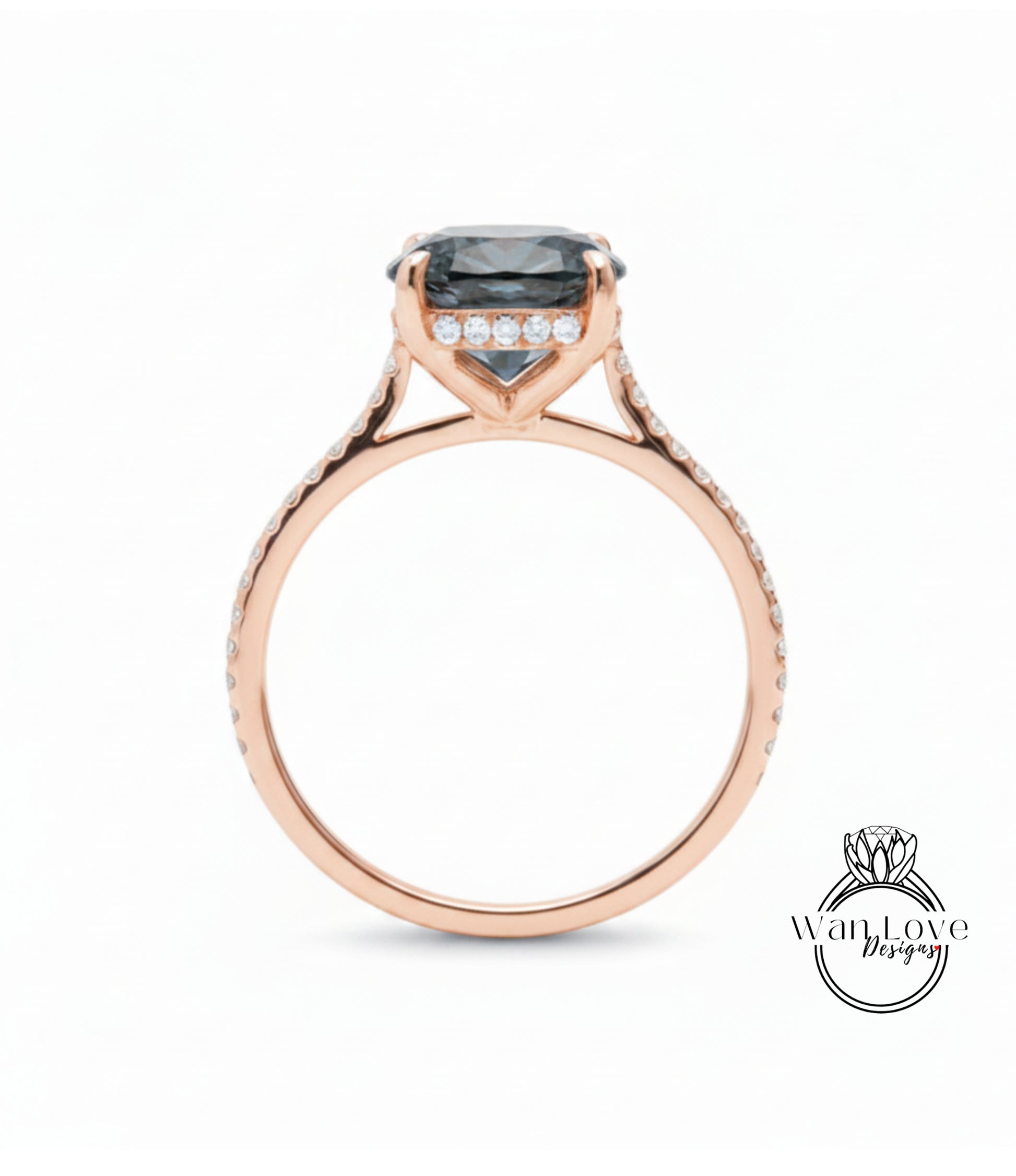 A rose gold engagement ring with a large blue gemstone set in the center, surrounded by smaller diamonds.