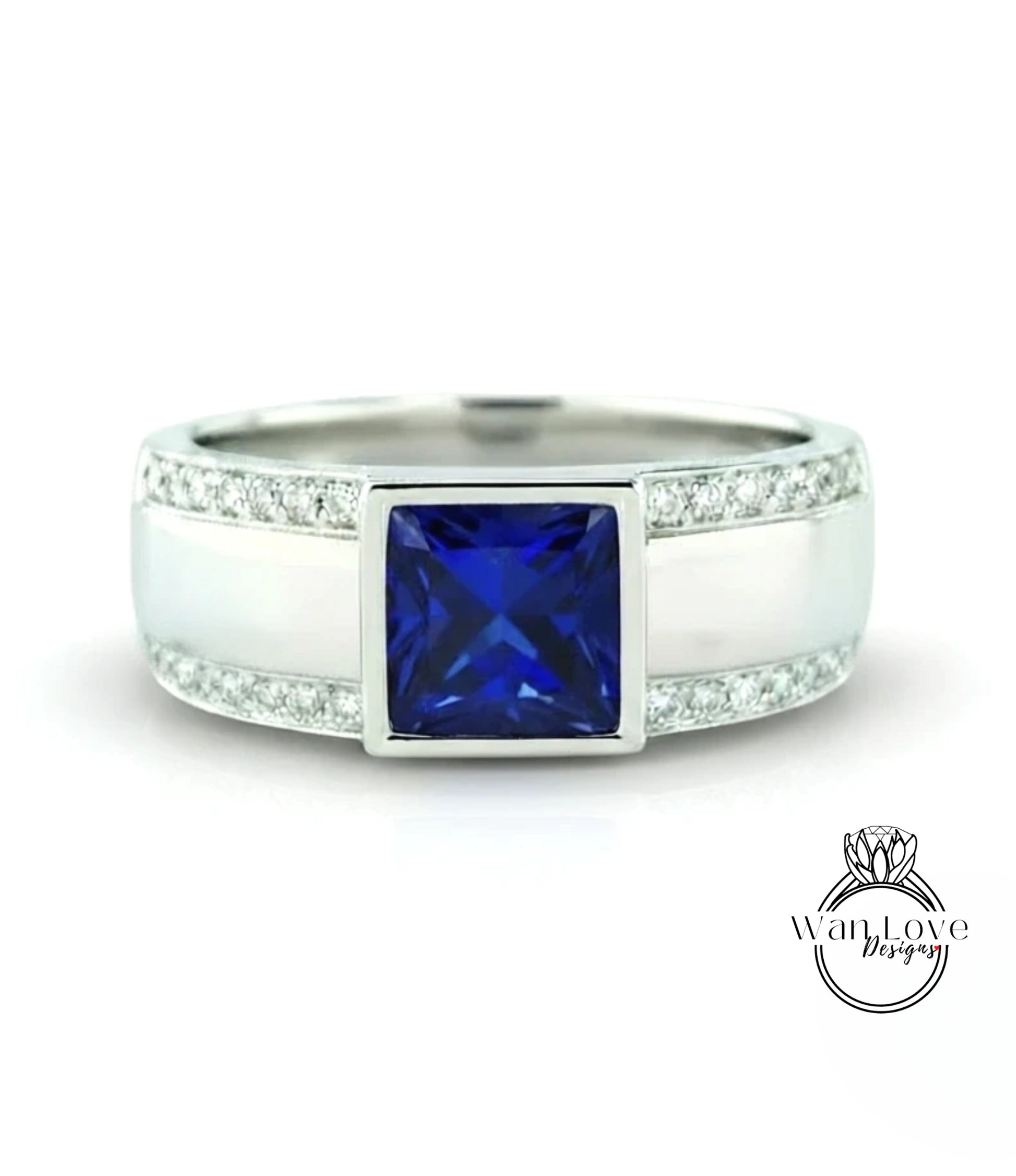A silver ring with a large blue gemstone in the center, surrounded by smaller diamonds.