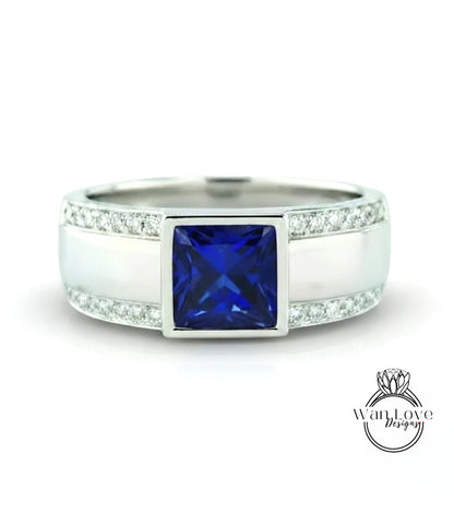 A silver ring with a large blue gemstone in the center, surrounded by smaller diamonds.