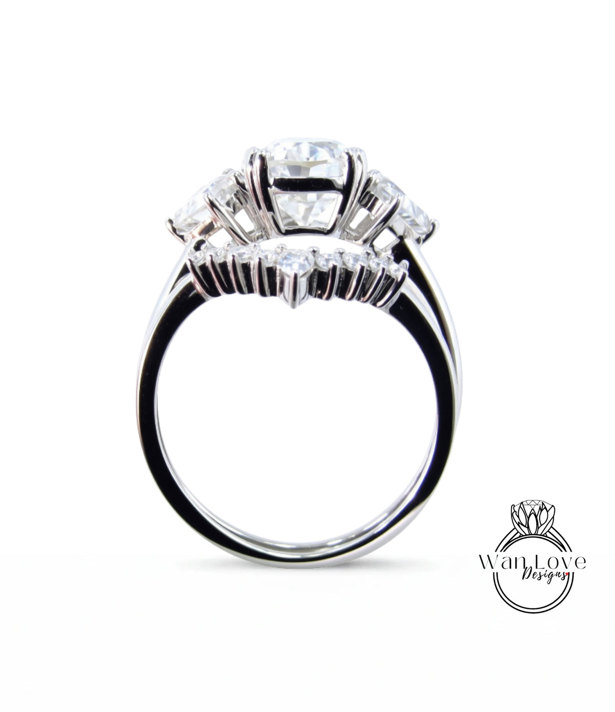 A silver ring with a large central diamond surrounded by smaller diamonds, showcasing a unique and elegant design.
