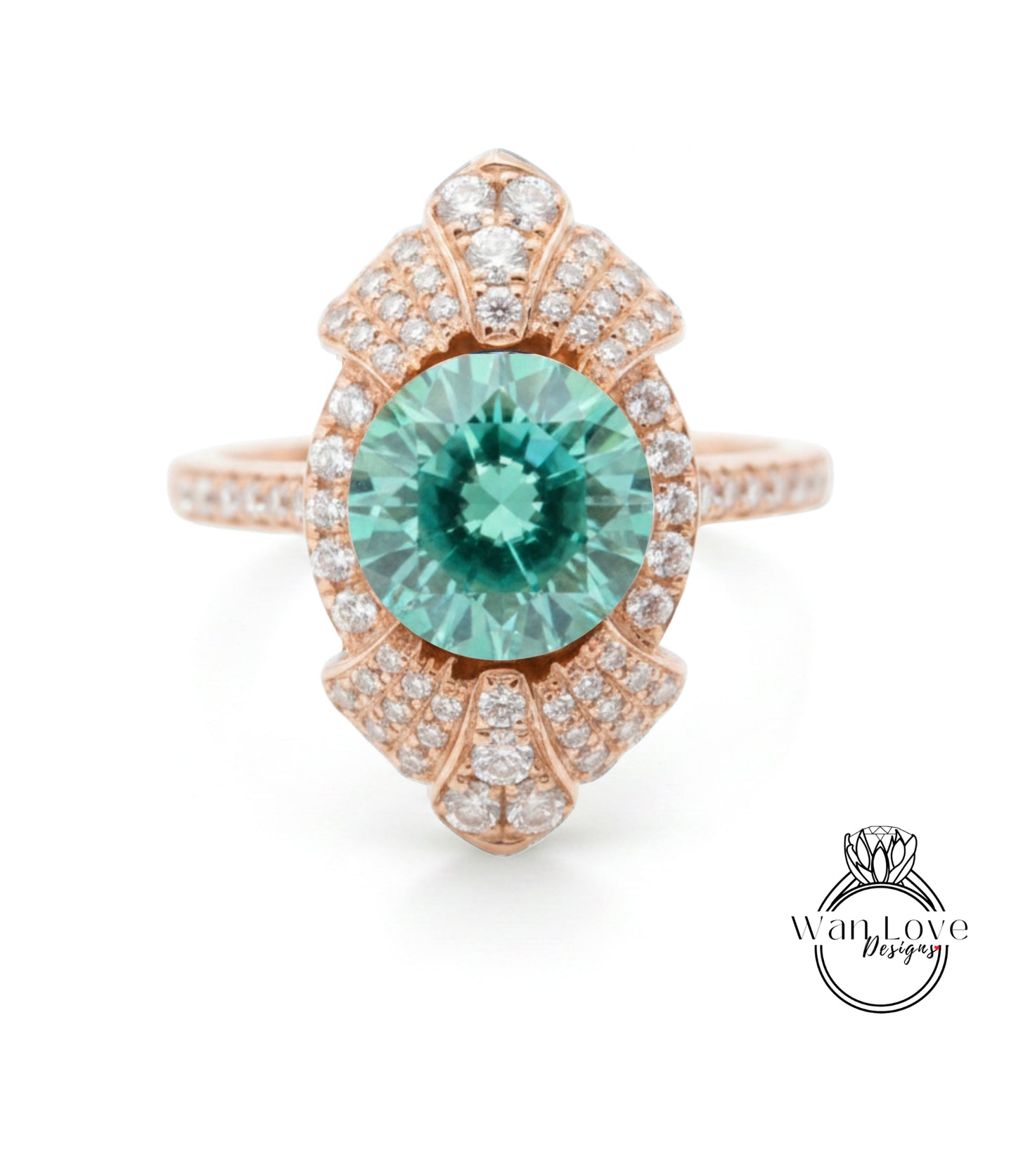 a beautiful ring with a large, round, green gemstone at the center, surrounded by a decorative design with numerous small diamonds.