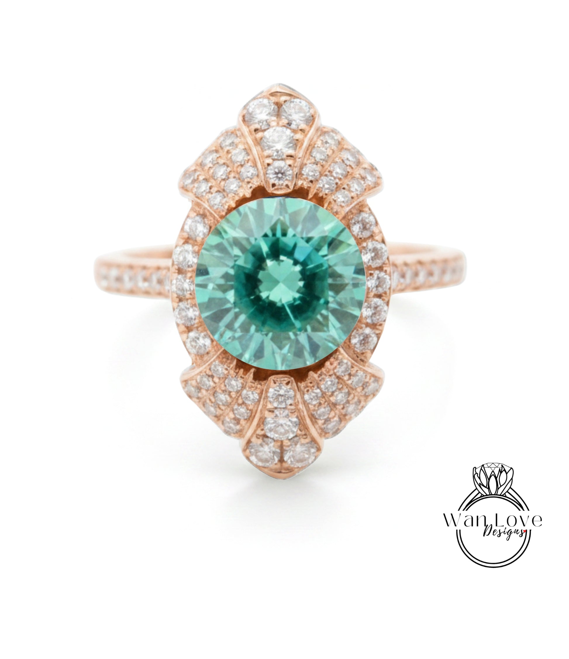 a beautiful ring with a large, round, green gemstone at the center, surrounded by a decorative design with numerous small diamonds.