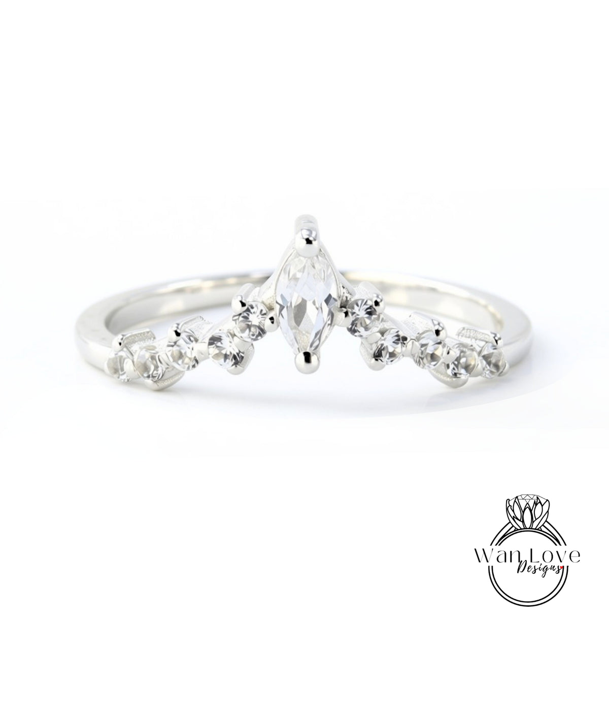 A silver ring with a large central diamond surrounded by smaller diamonds, set in a band.
