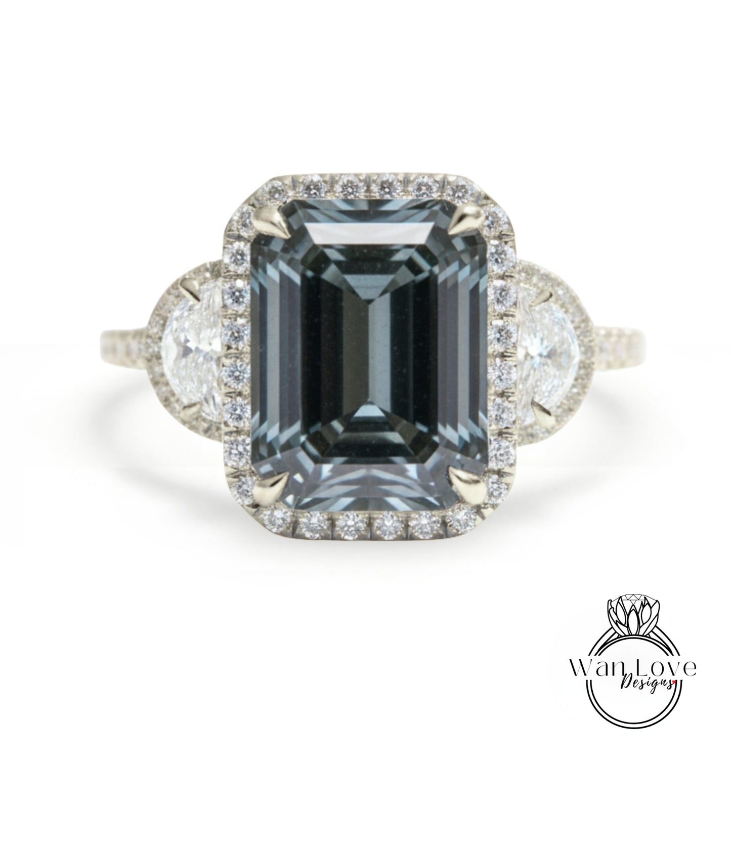 A large, dark blue diamond ring with a halo of smaller diamonds around the center stone.