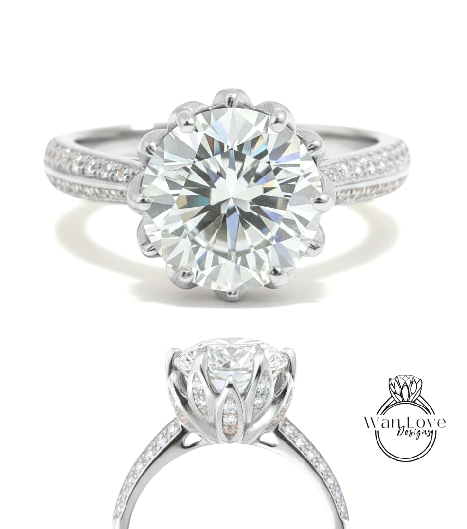 A stunning diamond engagement ring with a large round brilliant cut diamond set in a silver band adorned with small diamonds.