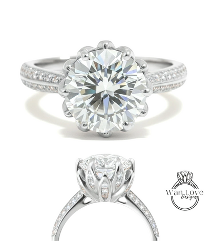 A stunning diamond engagement ring with a large round brilliant cut diamond set in a silver band adorned with small diamonds.