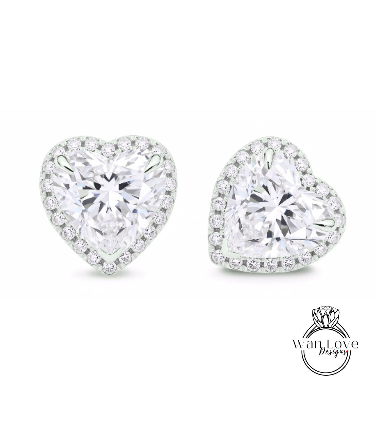 two diamond earrings with a heart-shaped design and a halo of smaller diamonds around the center.