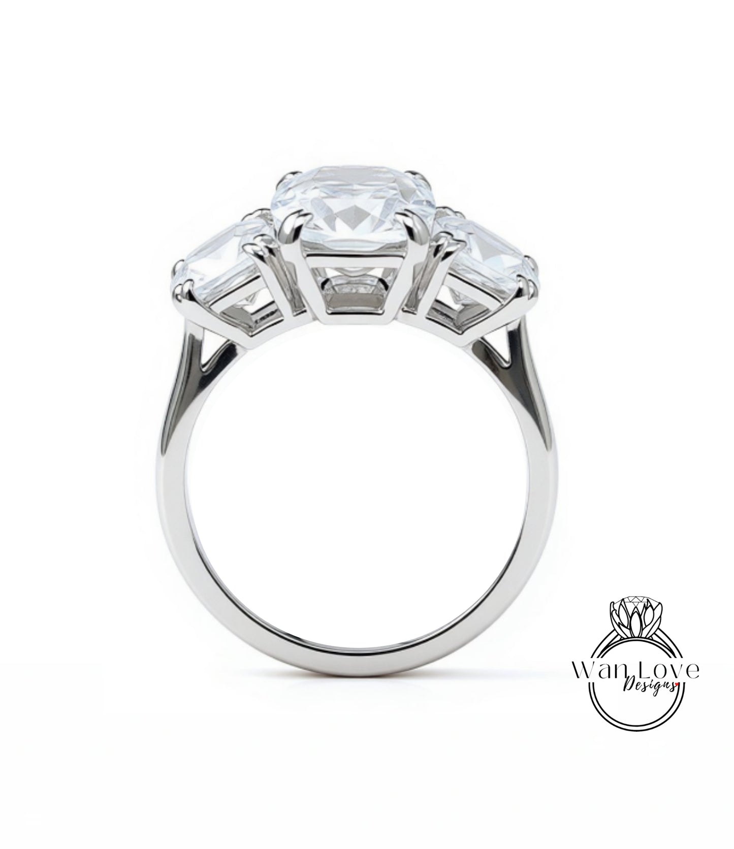 A silver ring with a large central diamond surrounded by three smaller diamonds on either side.