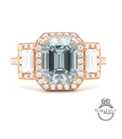 A close-up of a beautiful engagement ring with a large, clear gemstone surrounded by smaller diamonds.