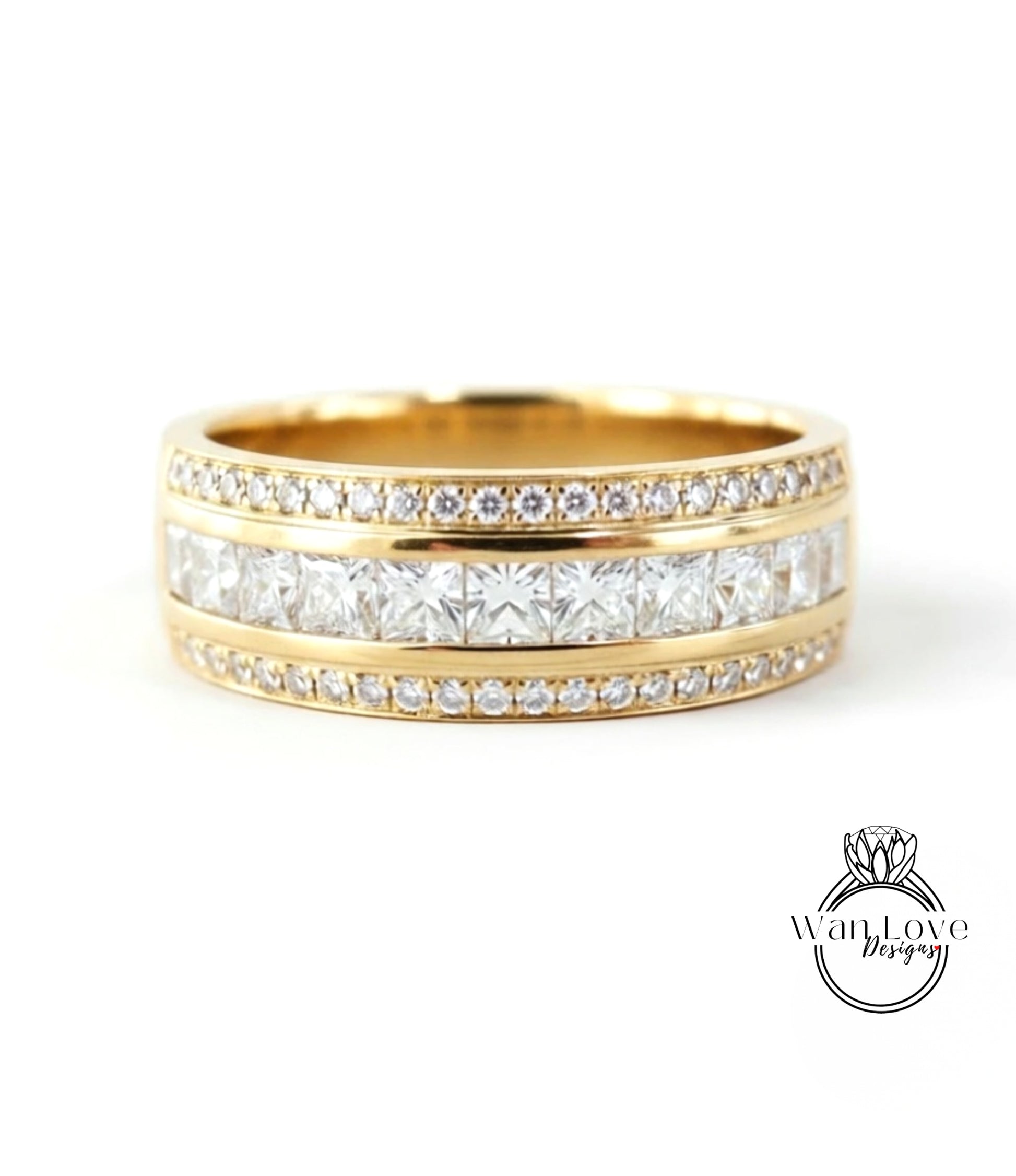 A gold band ring with a row of diamonds set in the center, showcasing a beautiful and elegant design.
