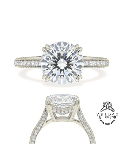 A stunning diamond engagement ring with a large round brilliant cut diamond set in a solitaire ring band, showcasing the intricate details and craftsmanship of the jewelry.