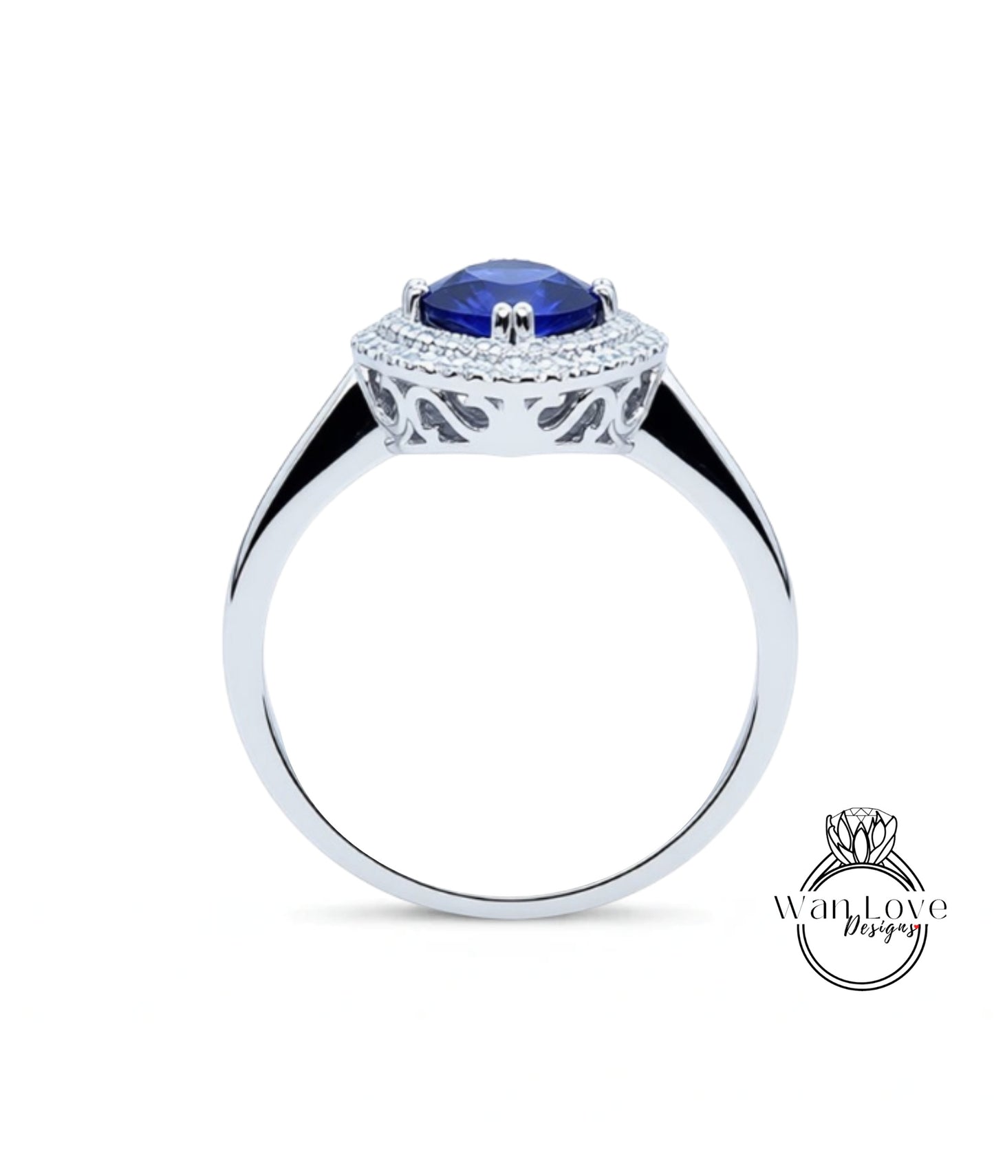 A silver ring with a large blue gemstone set in the center, surrounded by a decorative metal band.