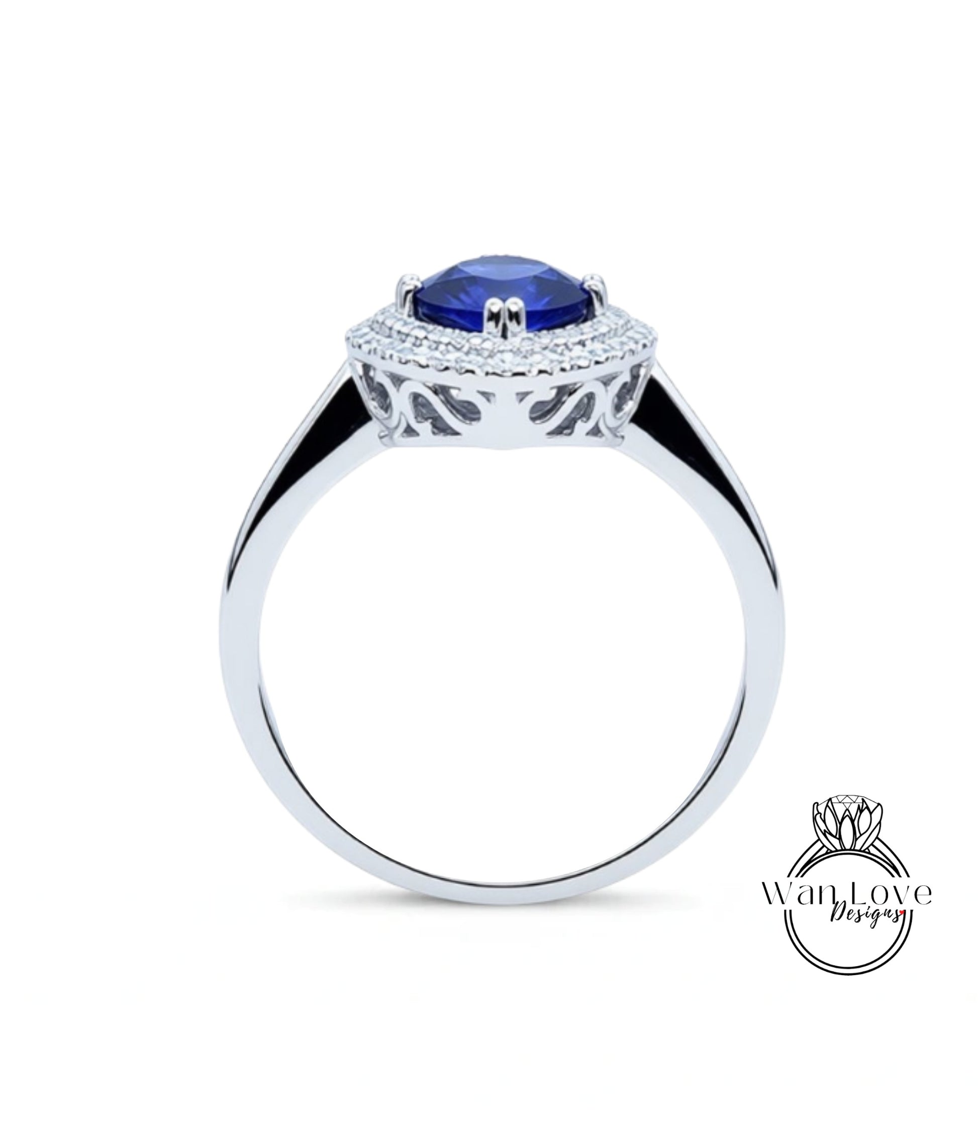 A silver ring with a large blue gemstone set in the center, surrounded by a decorative metal band.