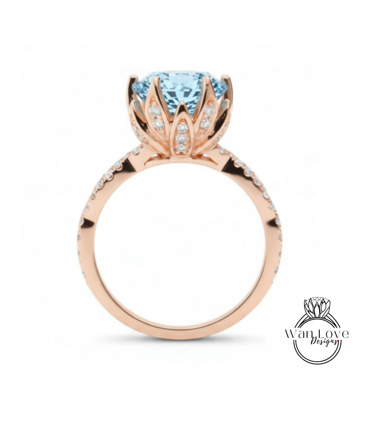 A rose gold ring with a large blue gemstone, likely a diamond, set in the center.