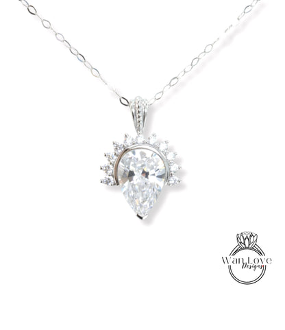 A necklace with a large, clear gemstone pendant, which appears to be a diamond.