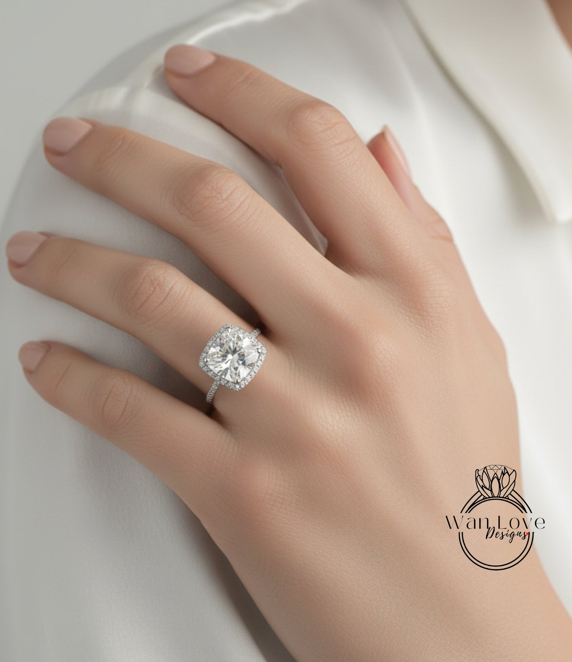 A close-up of a person's hand wearing a large, sparkling diamond engagement ring.