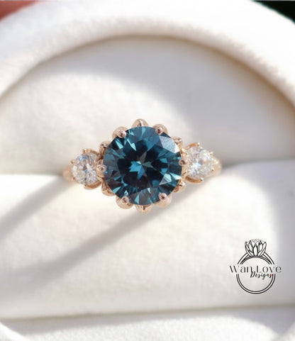 A close-up image of a gold ring with a large blue gemstone, showcasing the intricate details and craftsmanship of the jewelry.