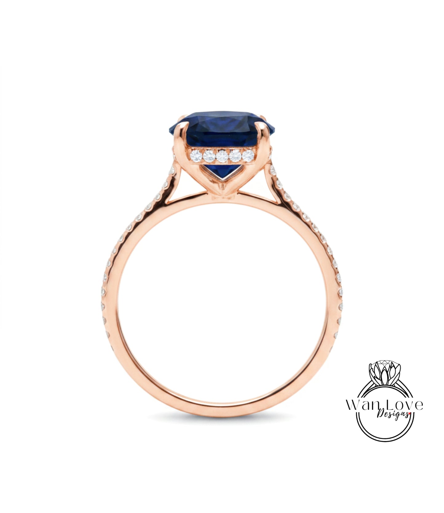 A rose gold engagement ring with a large blue gemstone and small diamonds set in the band.
