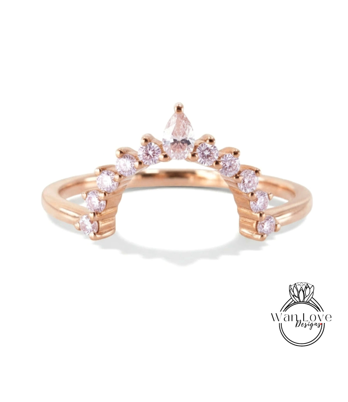 A rose gold ring with a unique design featuring a central diamond surrounded by smaller diamonds arranged in a fan-like pattern.