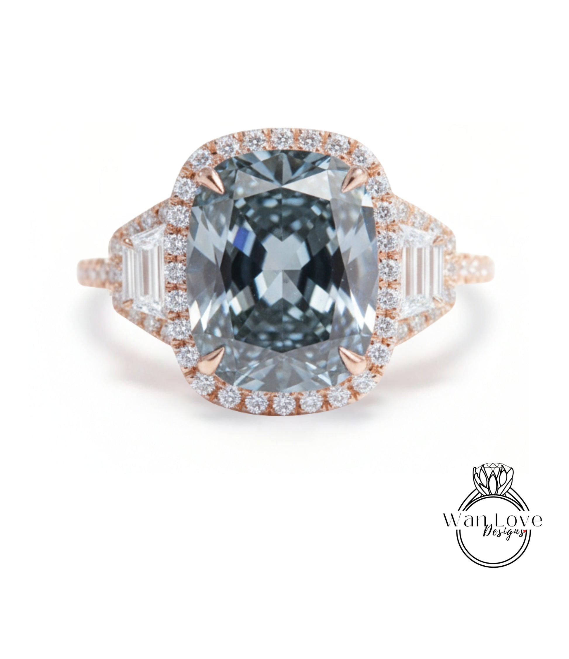 A large, blue diamond ring with a halo of smaller diamonds around the center stone.