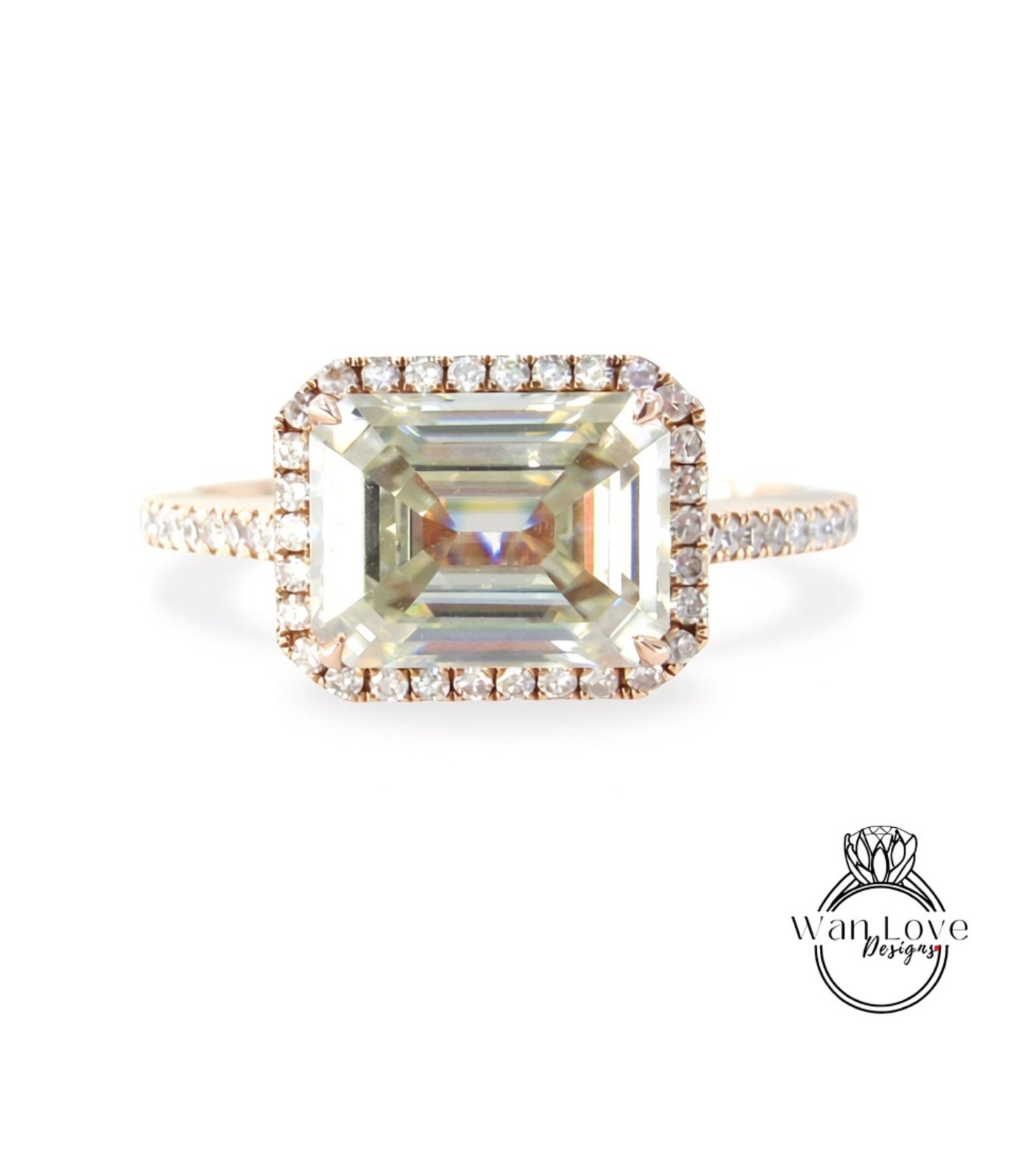 A large, square-cut diamond engagement ring with a halo of smaller diamonds around the center stone.