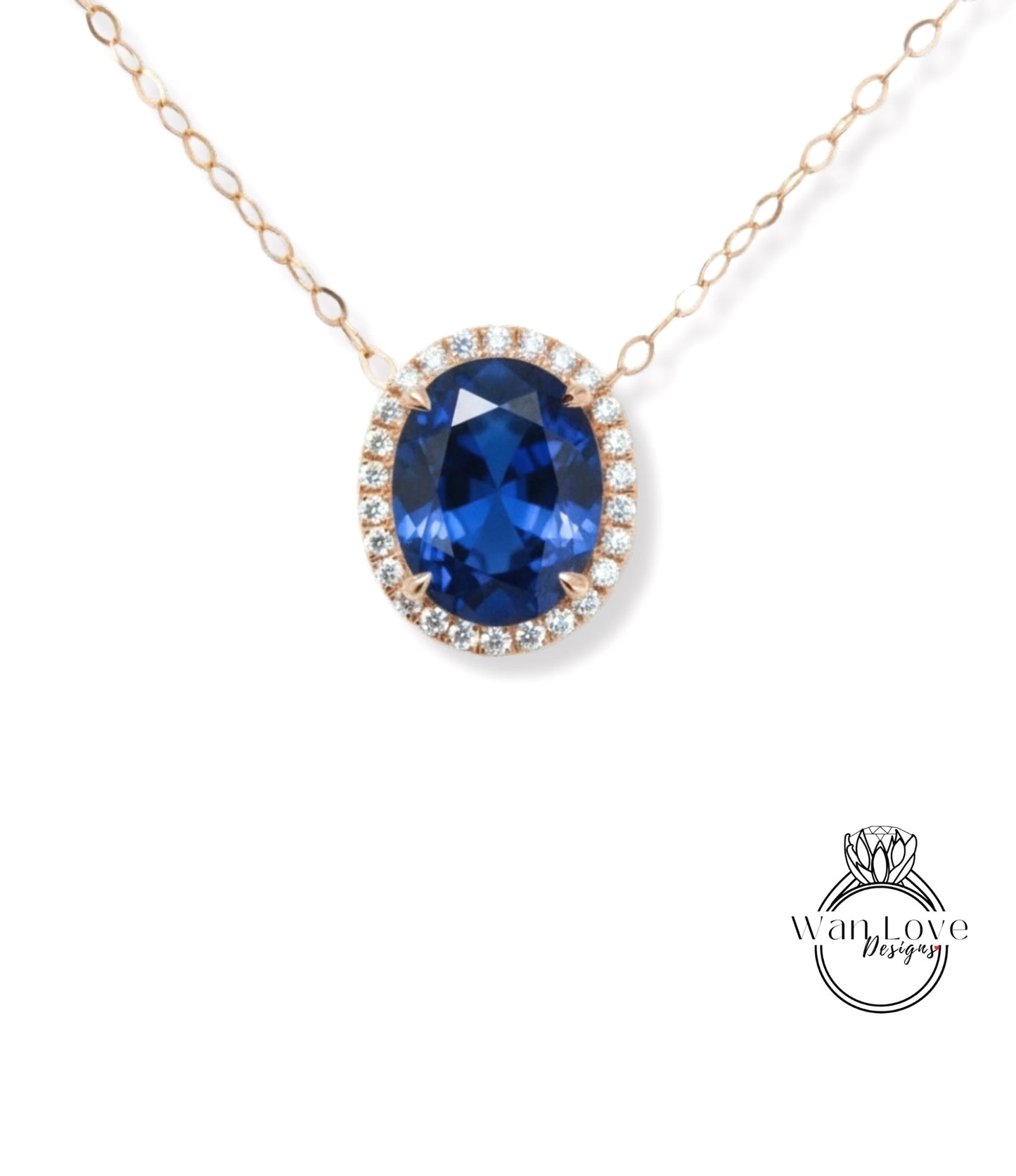 A necklace with a large oval-shaped blue gemstone surrounded by a halo of smaller diamonds.