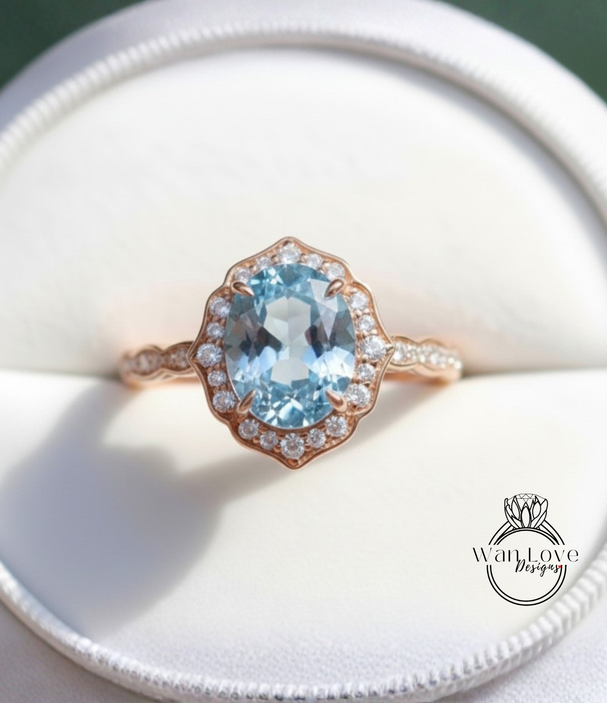 A close-up view of a gold ring with a large blue gemstone, likely a diamond, set in a halo of smaller diamonds.