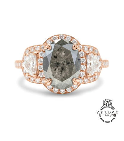 a beautiful ring with a large oval-shaped diamond at the center, surrounded by smaller diamonds and set in a rose gold band.