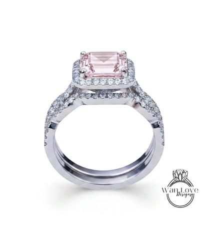 A beautiful engagement ring with a large pink gemstone set in a halo of smaller diamonds, showcasing the intricate craftsmanship and attention to detail.