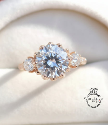 A close-up image of a beautiful engagement ring with a large, brilliant-cut diamond set in a gold band, surrounded by smaller diamonds.