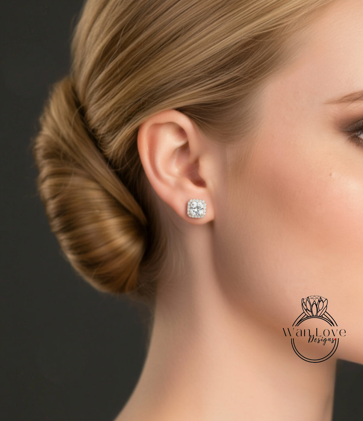 A close-up of a woman's face, focusing on her ear with a diamond earring.