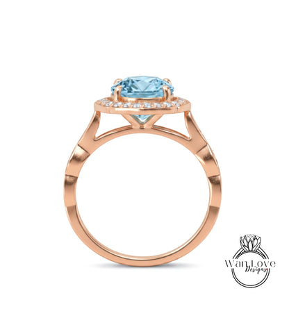 A gold ring with a large blue gemstone set in the center, surrounded by smaller diamonds.