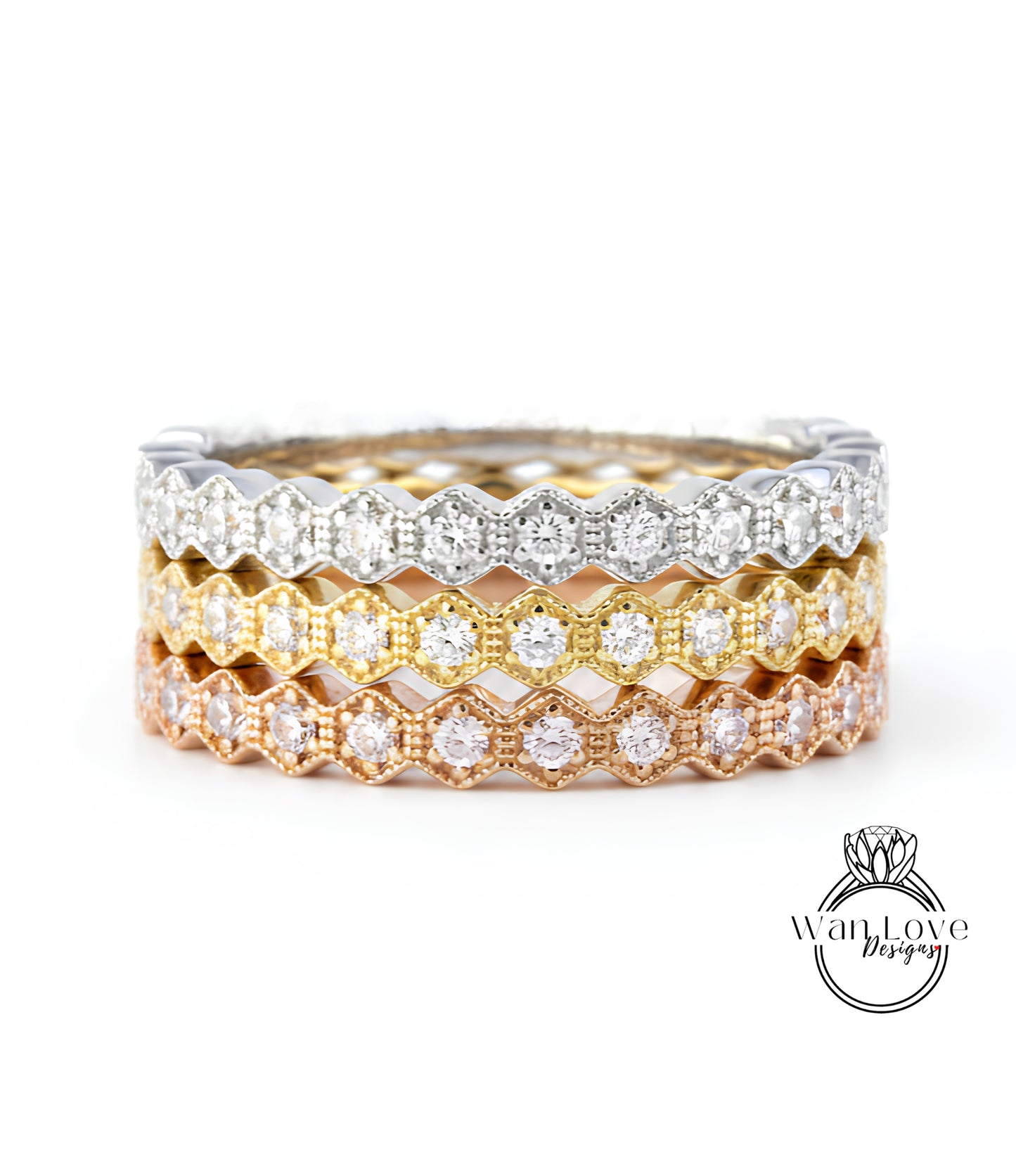 A close-up view of a ring with multiple layers of rings stacked on top of each other, showcasing the intricate design and sparkling diamonds.