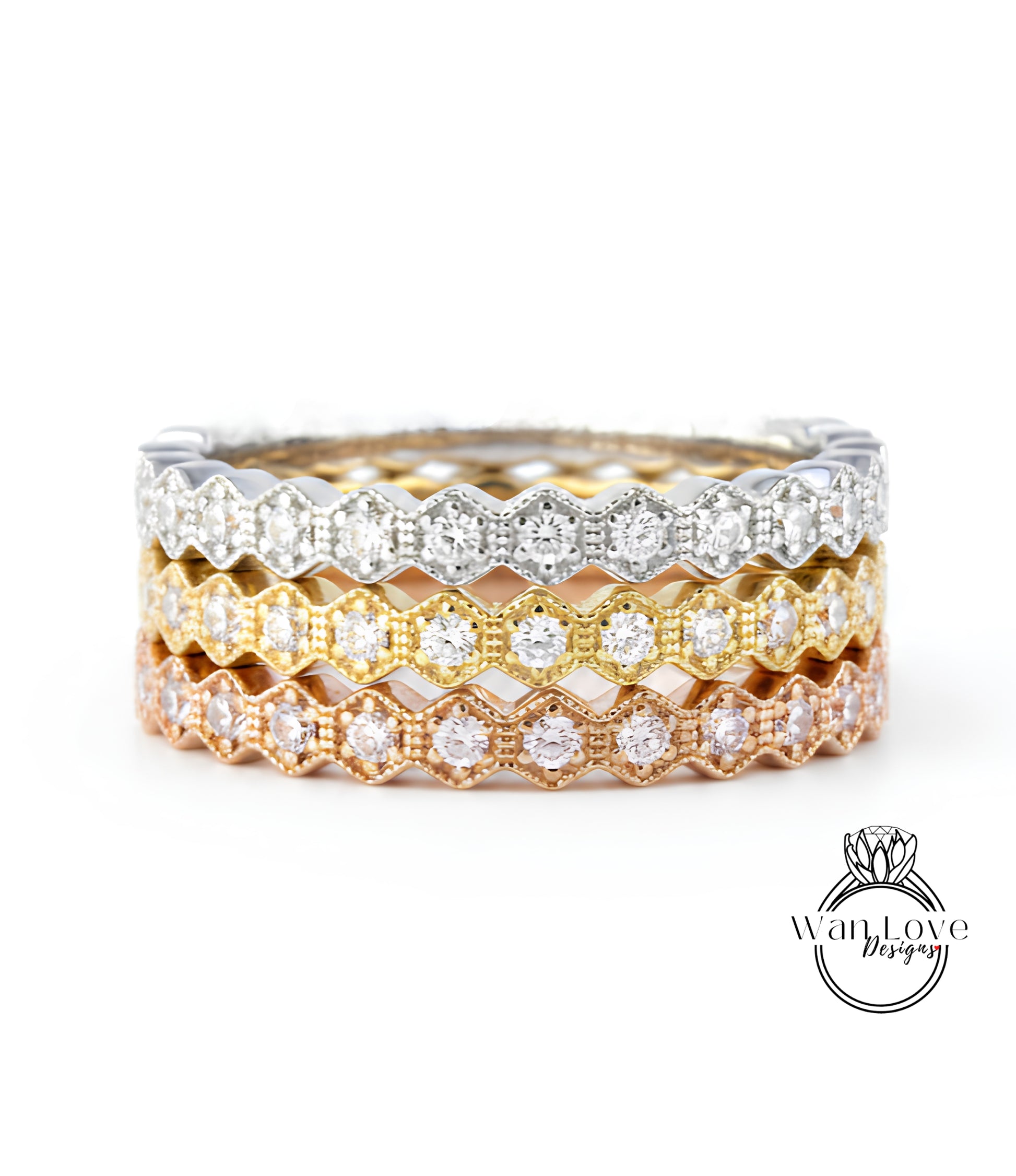 A close-up view of a ring with multiple layers of rings stacked on top of each other, showcasing the intricate design and sparkling diamonds.