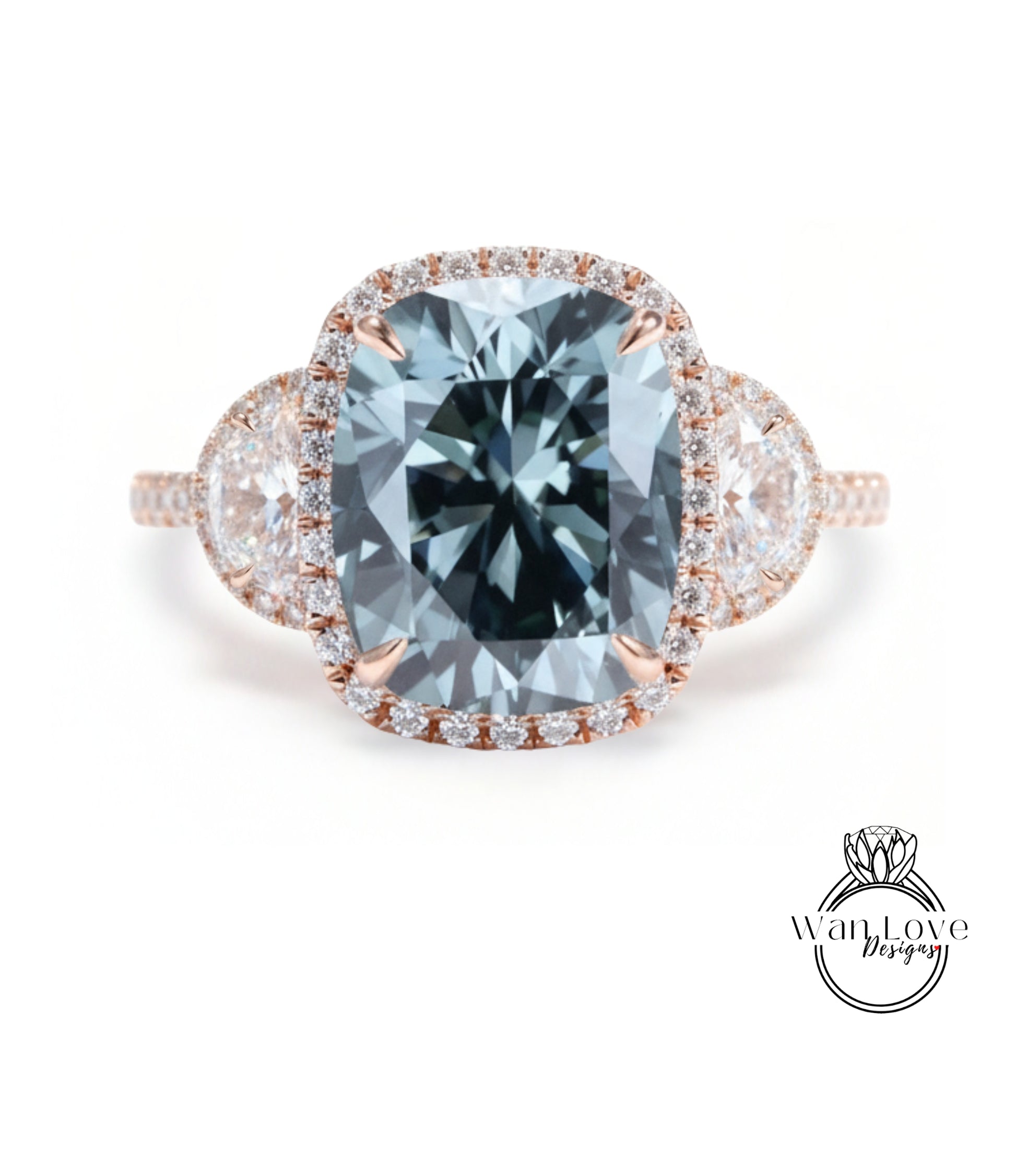 A large, blue diamond ring with a halo of smaller diamonds around the center stone.