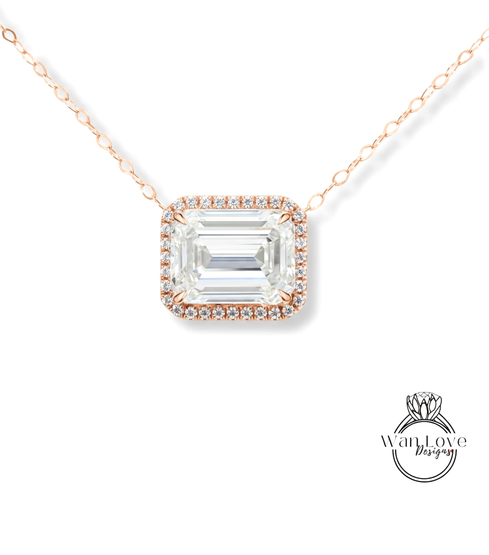 A necklace with a large, clear gemstone pendant surrounded by a halo of smaller diamonds.