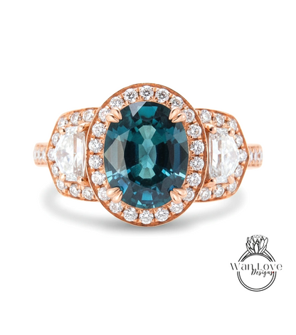 A beautiful engagement ring with a large oval-shaped blue gemstone surrounded by smaller diamonds, set in a halo of smaller diamonds.