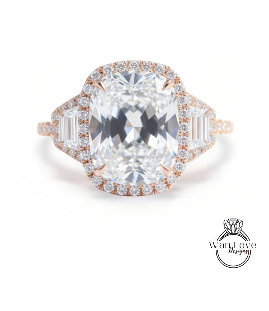 A large, oval-shaped diamond ring with a halo of smaller diamonds around the center stone.