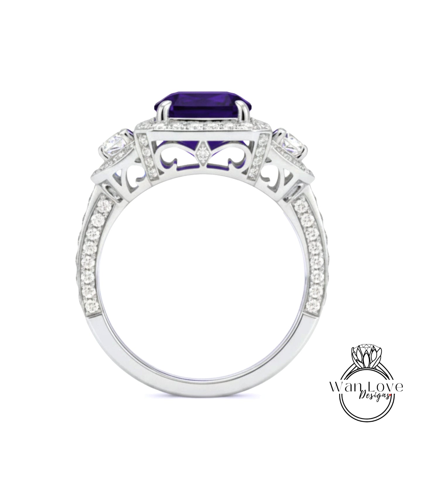 A silver ring with a large purple gemstone, surrounded by smaller diamonds and intricate designs.